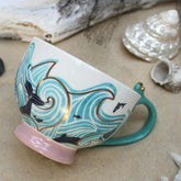 By The Sea  Storm Tea Cup